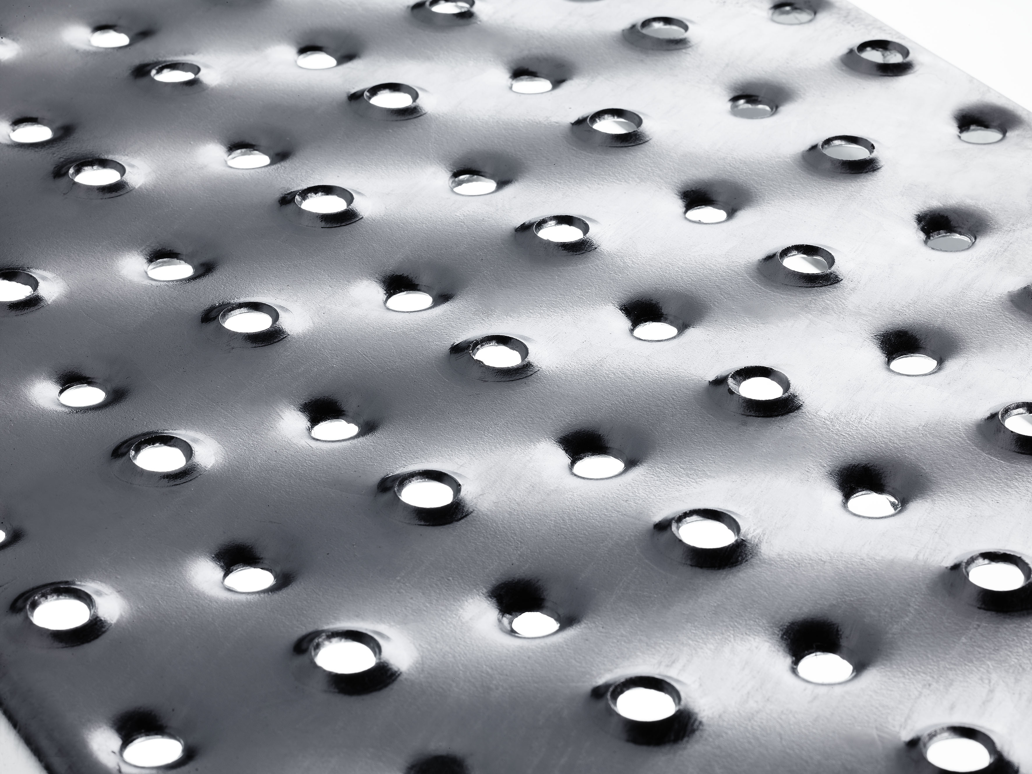 Illustration of perforated metal planks with perforated surface